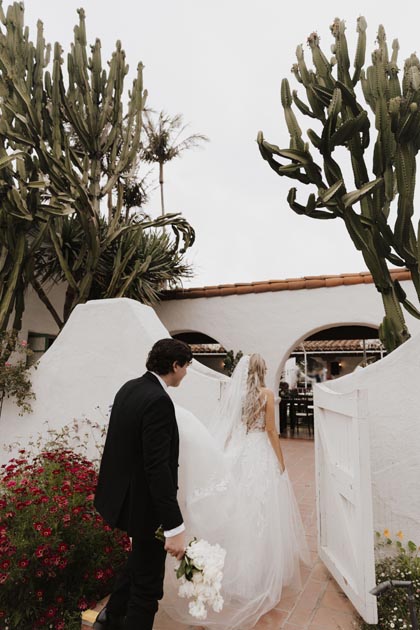 Bride and groom see their wedding reception design for the first time