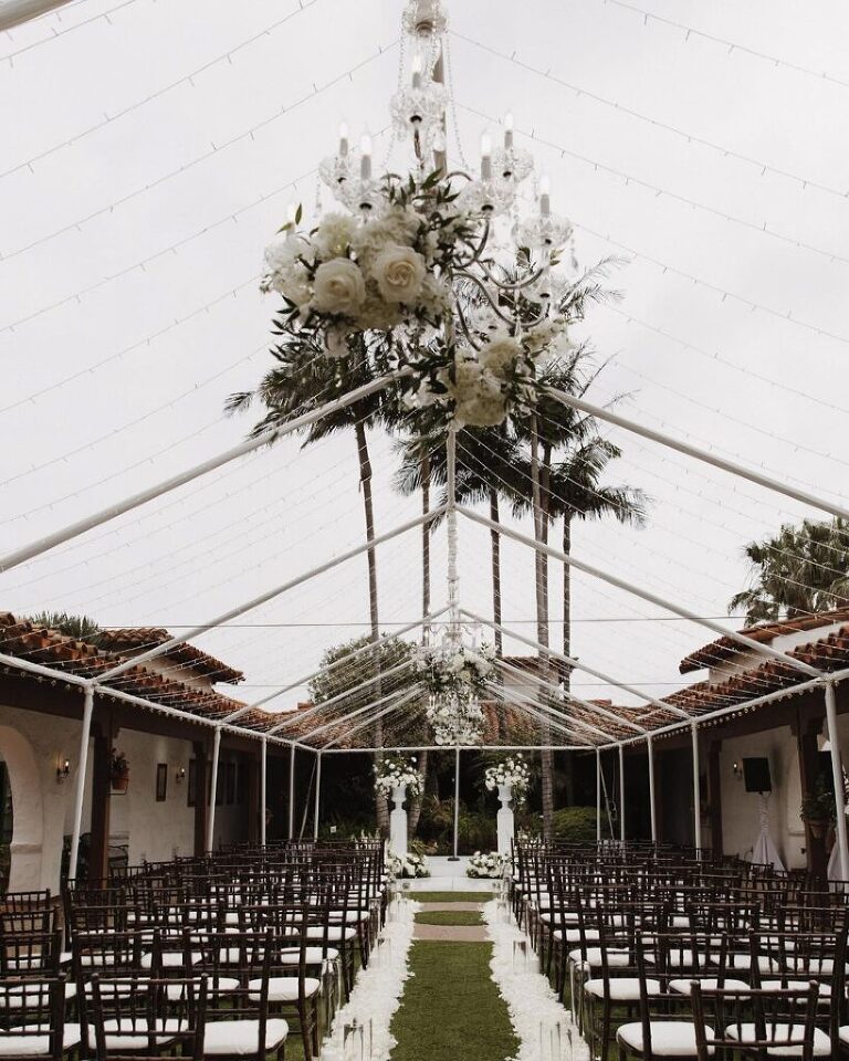 Elegant and contemporary floral designs at an Casa Romantica outdoor ceremony.